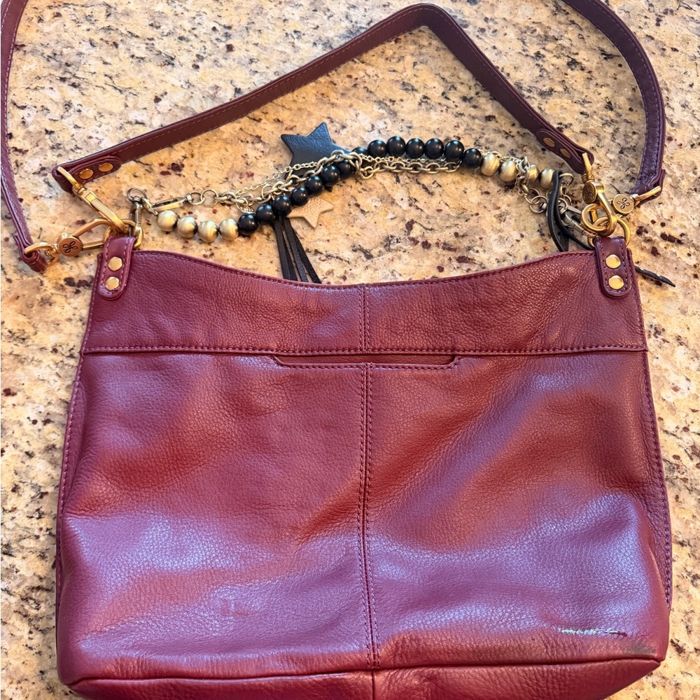 HOBO Burgundy Leather Shoulder Bag with Black Tassel and Gold Hardware - Picture 5 of 9